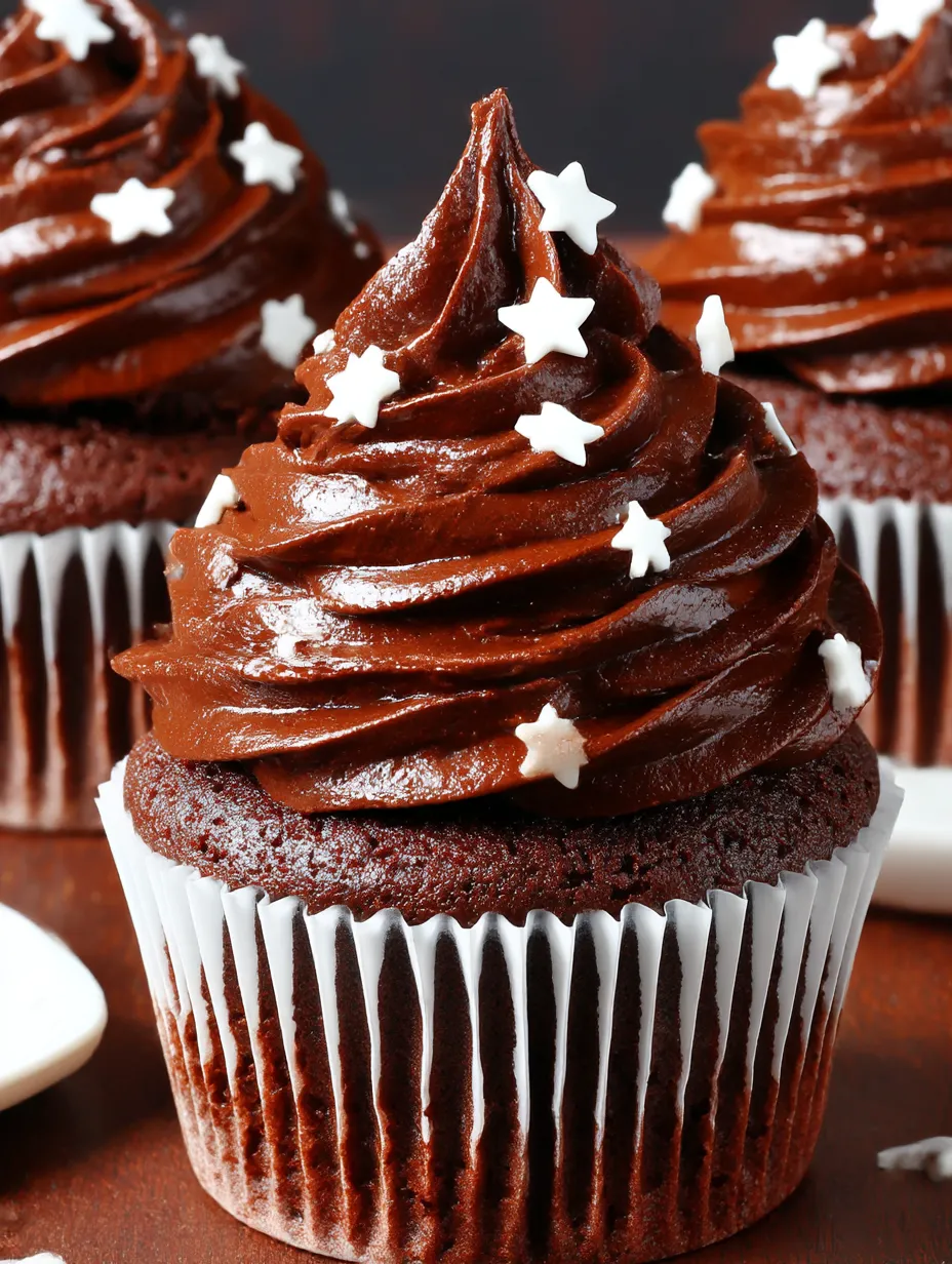 A chocolate cupcake with stars on top.