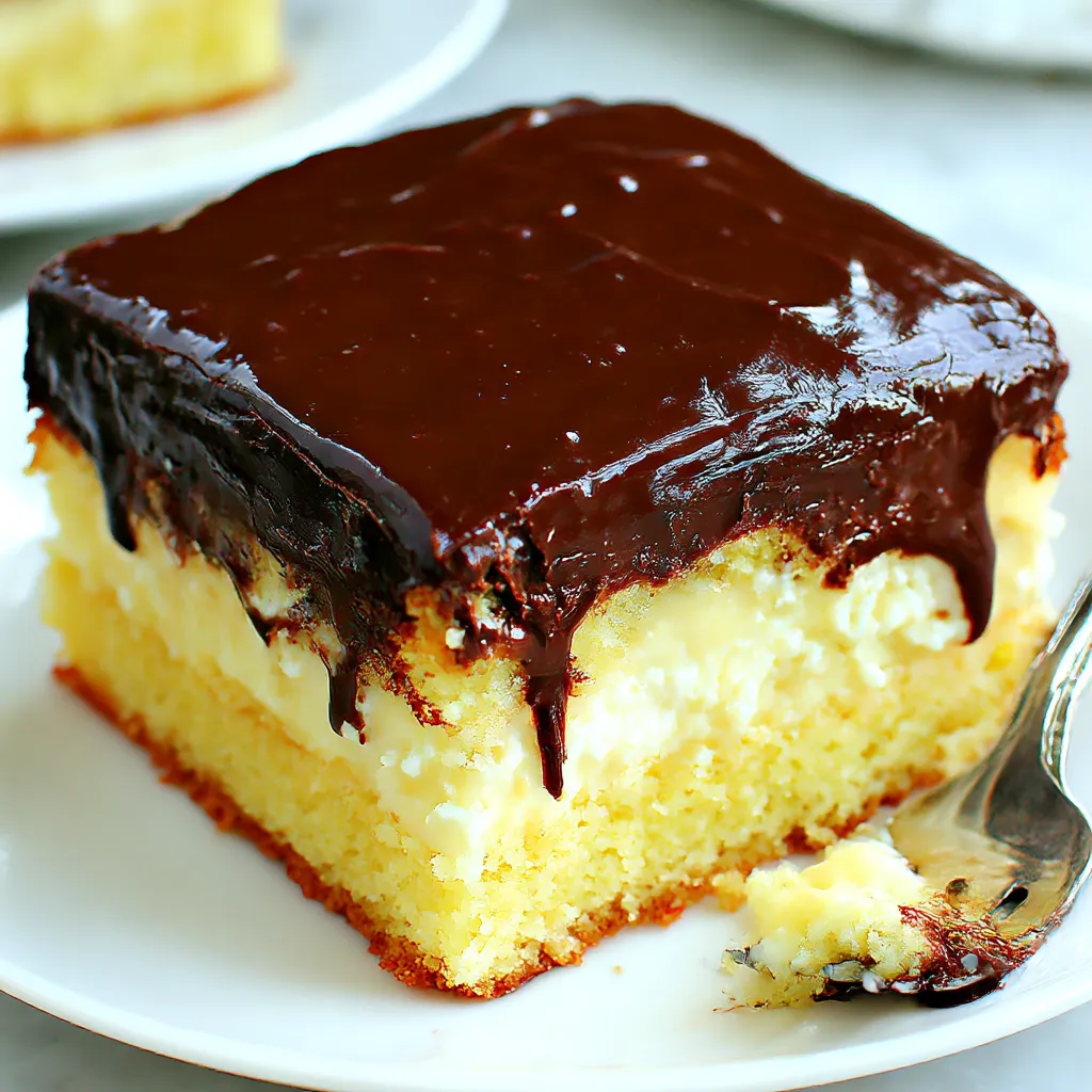 A piece of chocolate cake with white frosting.