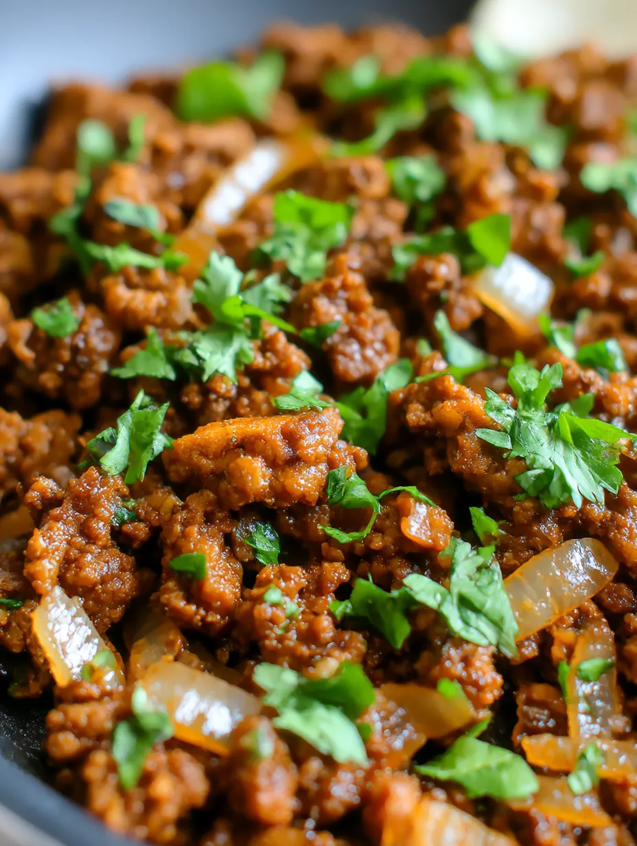 A close up of a delicious taco meat dish.