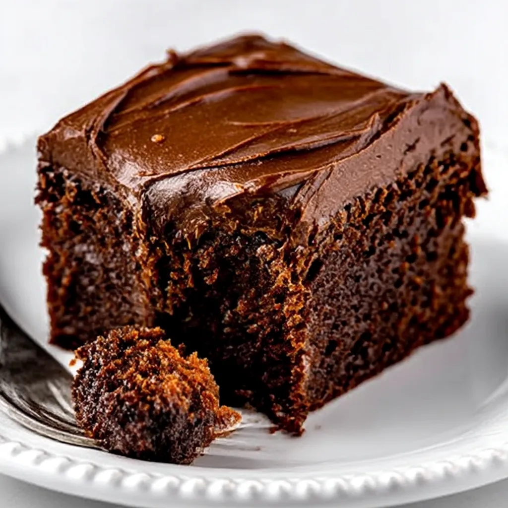 A piece of chocolate cake on a plate.