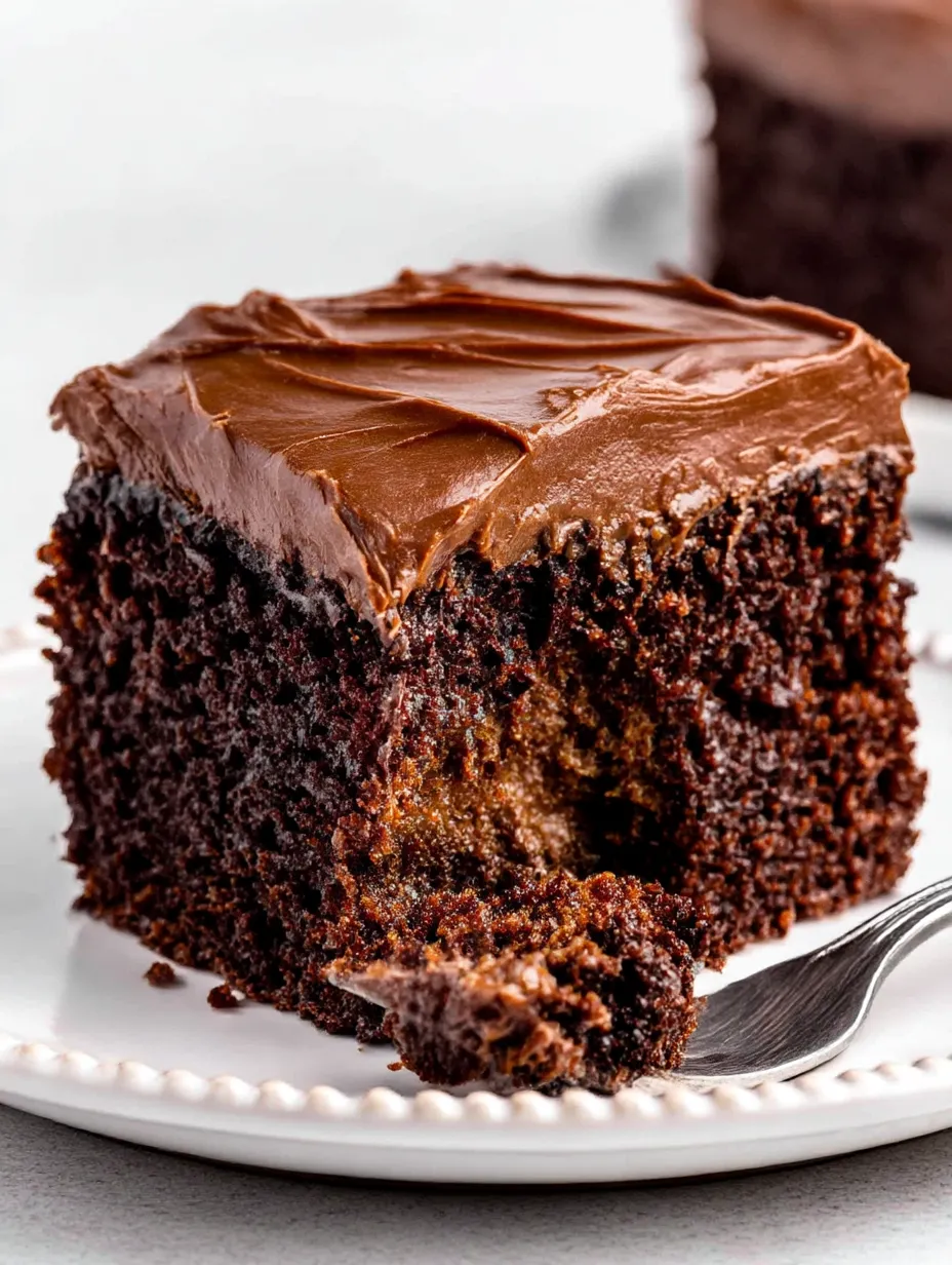 A slice of chocolate cake on a plate.