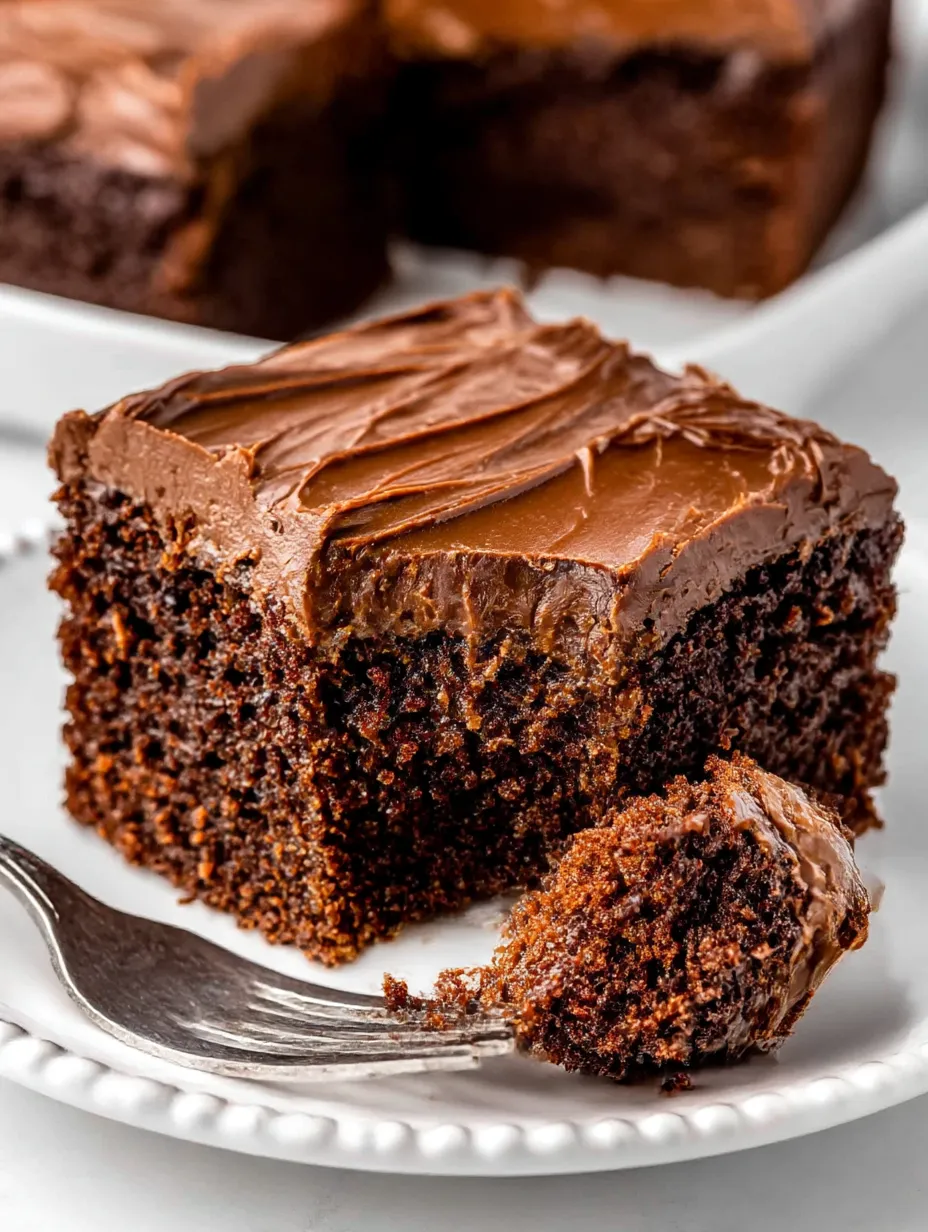 A slice of chocolate cake on a plate.